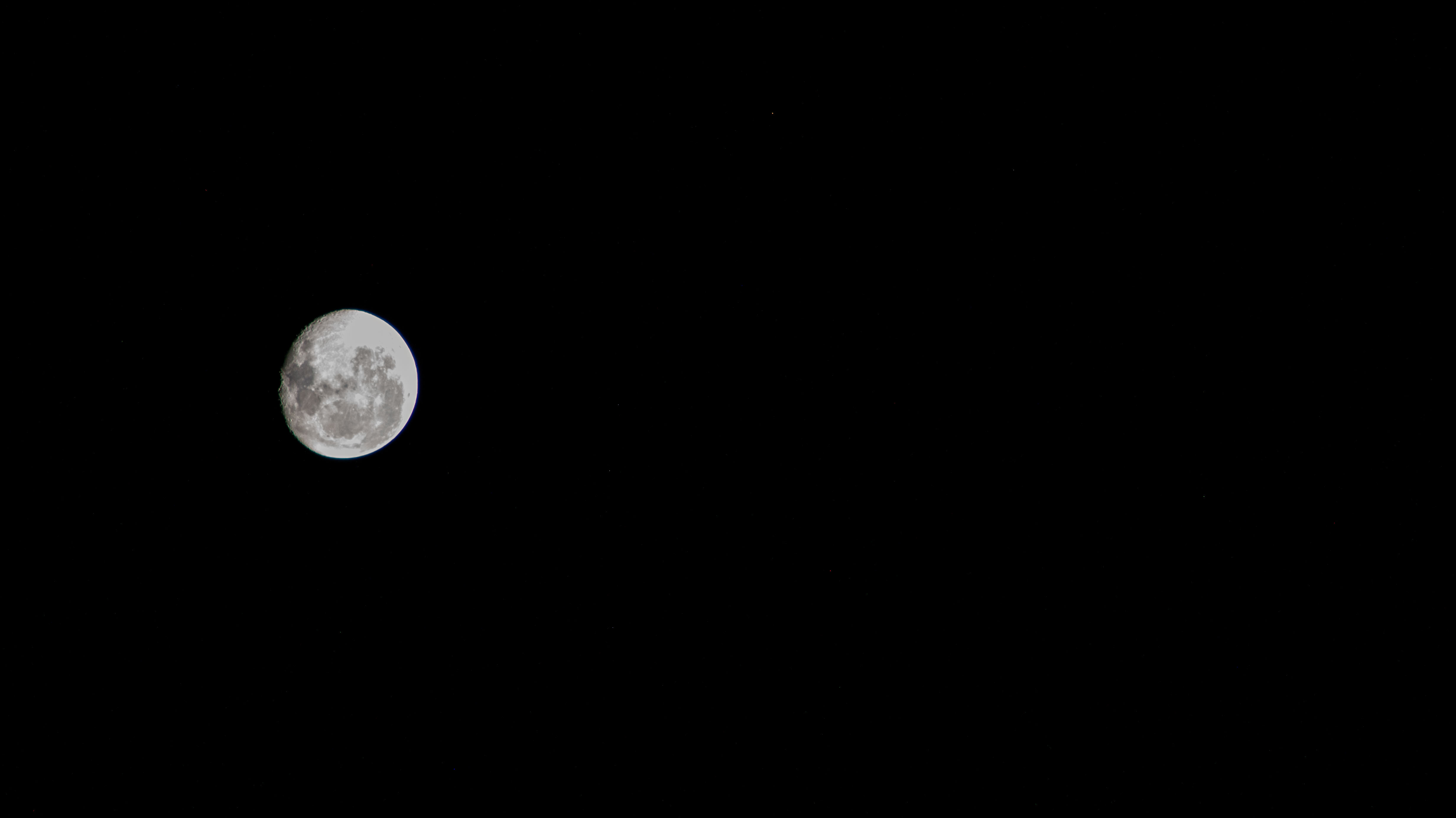 A waning gibbous Moon against the darkness of space